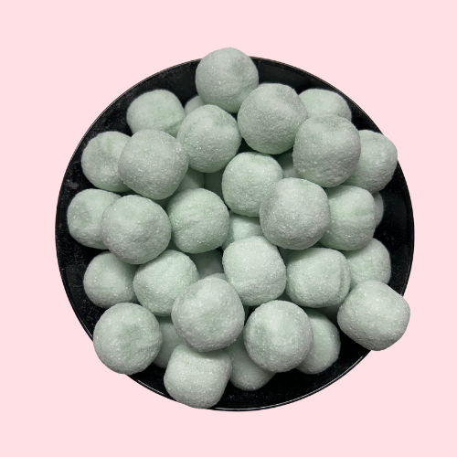 Zure appelkogels groen in zwart bakje