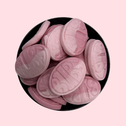 Bubs Strawberry Pomegranate roze ovale snoep in zwart bakje