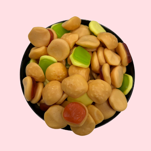 groen-gele-rode hamburger snoepjes in zwart bakje