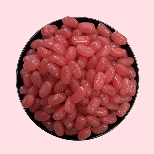 jelly beans in framboos smaak roze kleur in zwart bakje