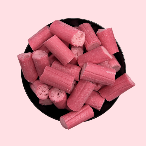 Kersenstokjes roze kleur in zwart bakje