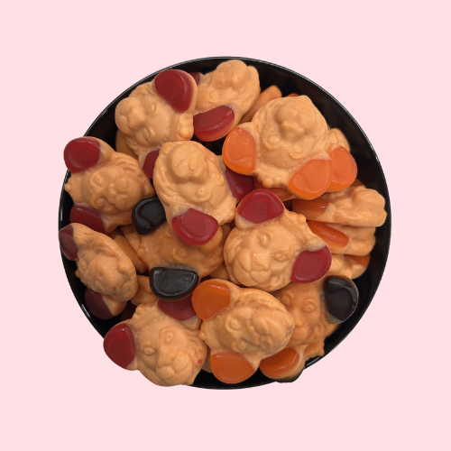 Leeuwenkoppen oranje snoep met rood en zwart