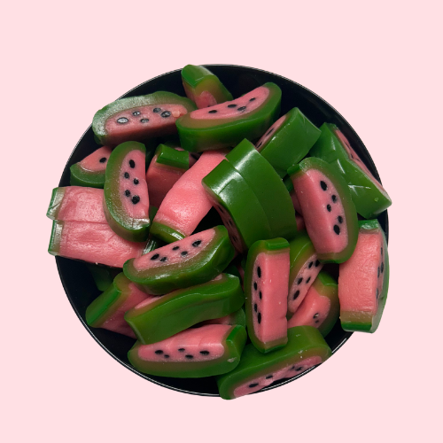 Groen-roze Watermelon slices snoepjes in zwart bakje