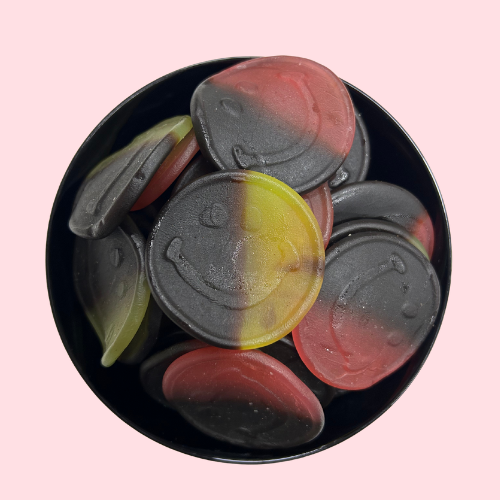Drop-fruit smiley gummies snoep geel zwart rood in zwart bakje