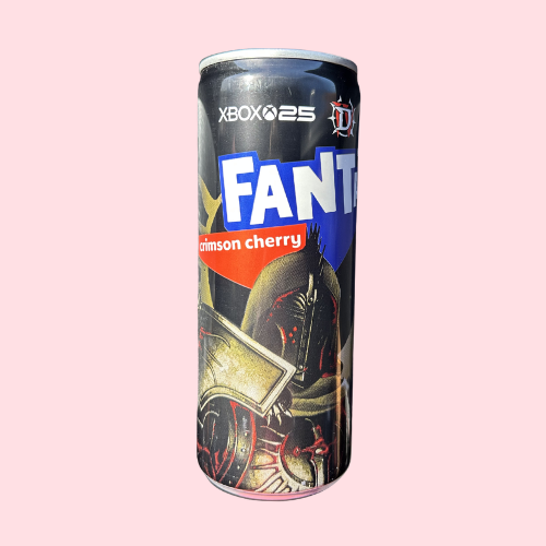 Fanta Crimson Cherry zwart blikje met game-figuur en fanta logo