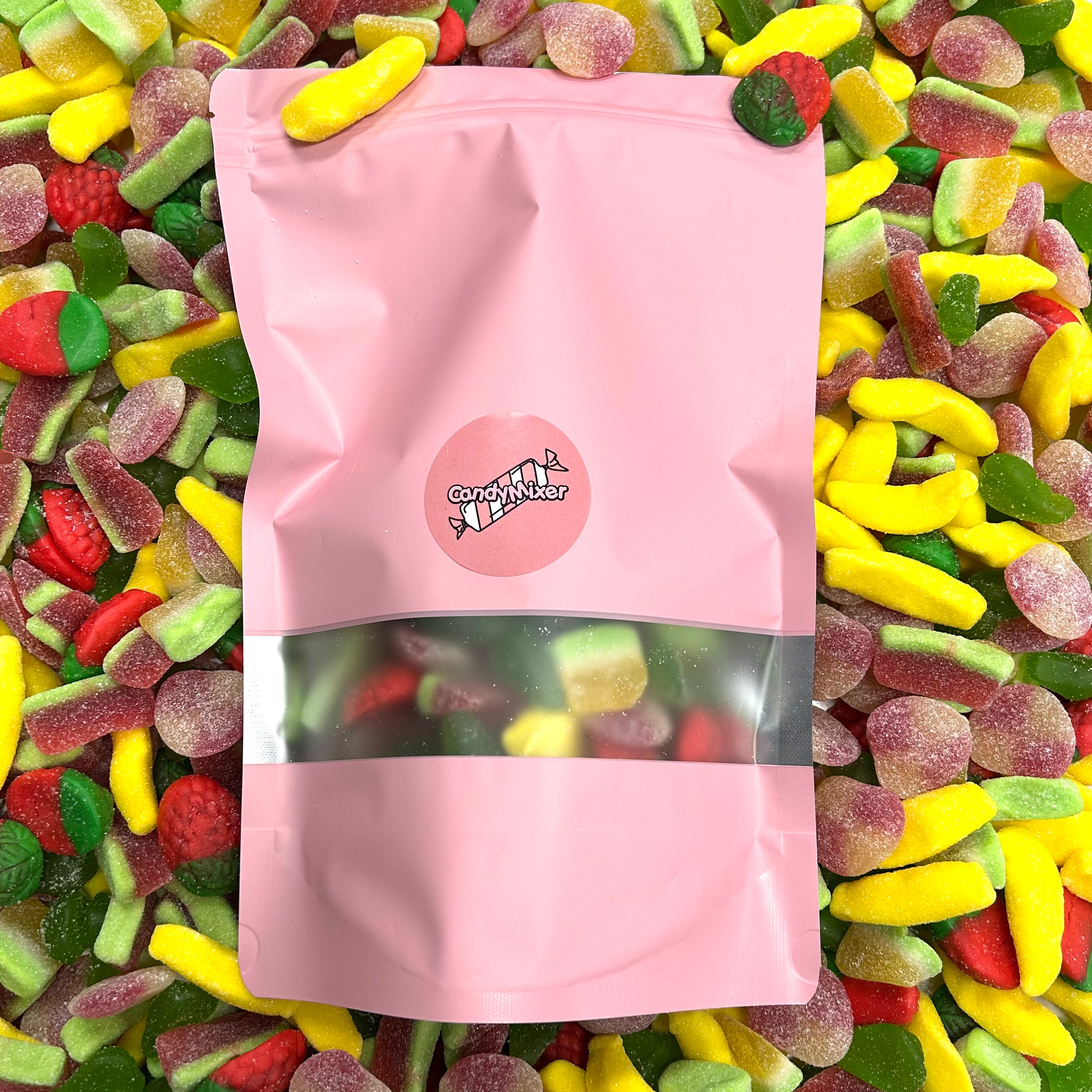 Fruity Paradise Mix met verschilende fruit snoep rood geel groen oranje, met roze candymixer snoepzak