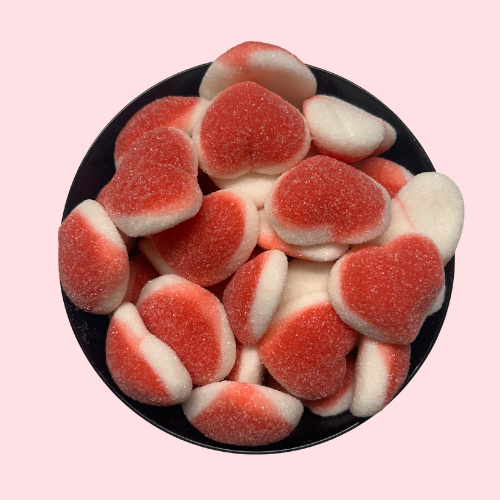 Hartjes snoep gesuikerd rood wit in zwart bakje