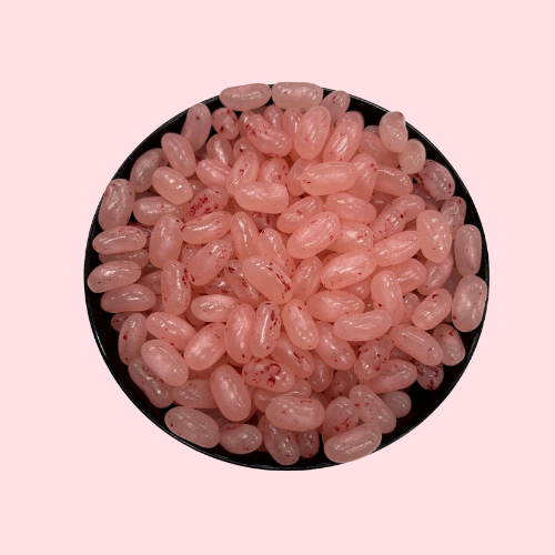 Roze jelly beans snoep in cheesecake smaak in zwart bakje