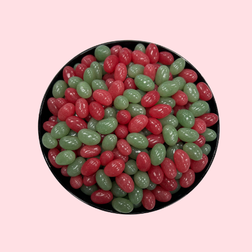 Rode-groene jelly beans snoepjes watermeloen smaak in zwart bakje