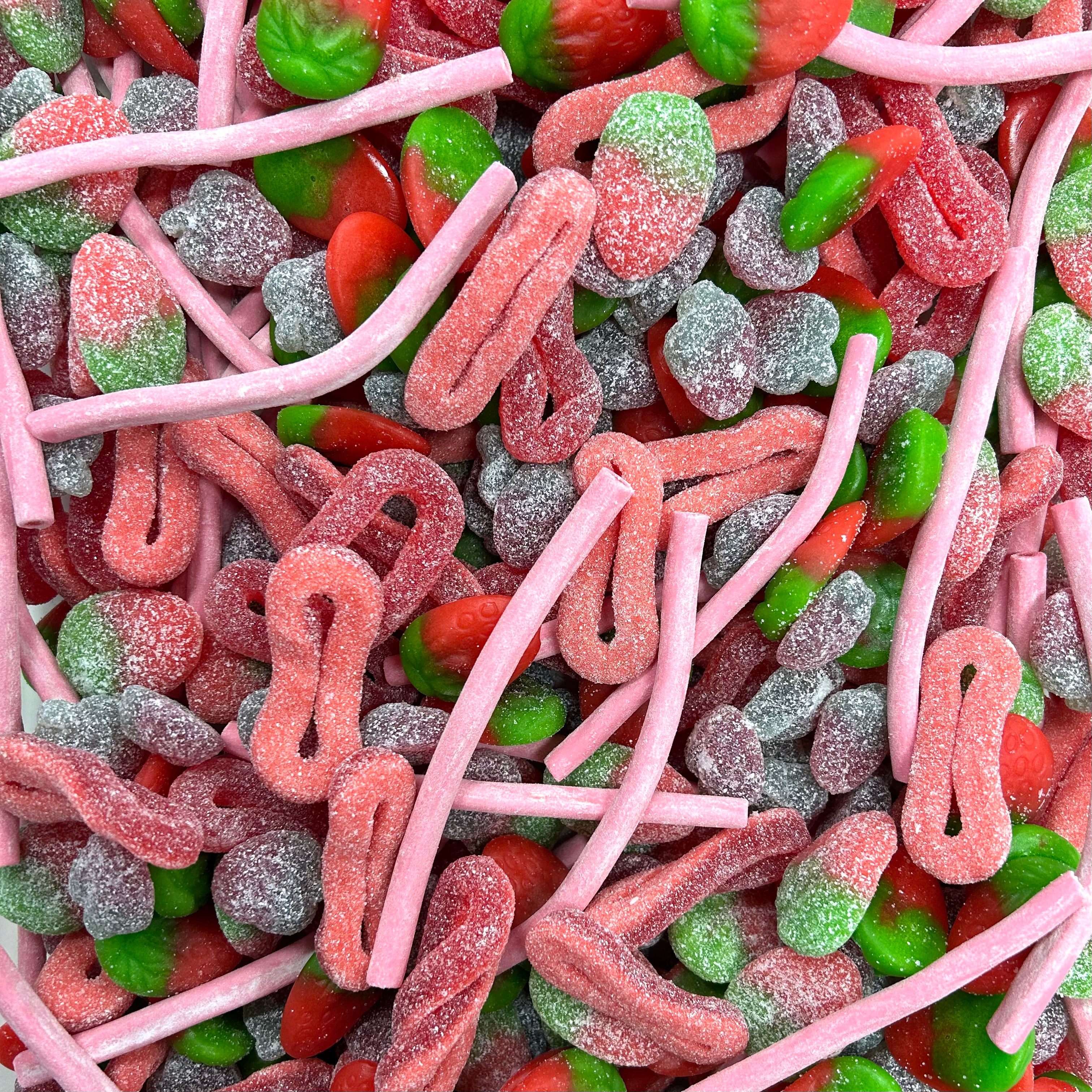 los aardbeien snoep ringen staafjes en zure aardbeitjes snoep