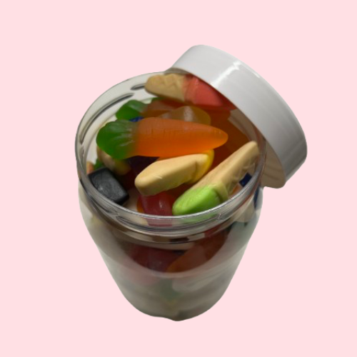 Schepsnoep pot met witte deksel en verschillende snoepjes