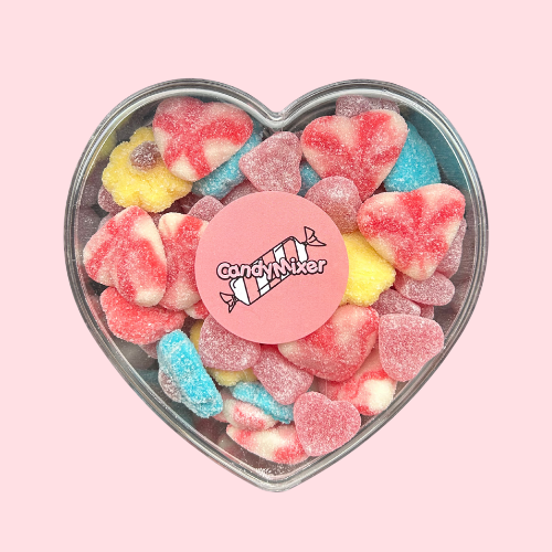 Valentijnsdag Snoephartje gevuld met twisted heart snoep, bloemen snoep en framboos hartjes snoep met roze candymixer sticker