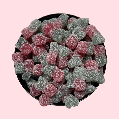 Gesuikerde zure kersjes rood en groen in zwart bakje